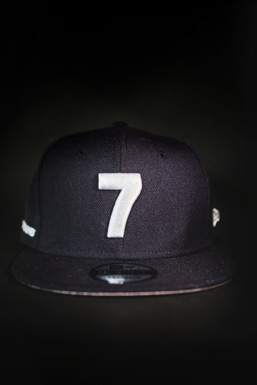 CMPD NEW ERA '7' NAVY/PINK BRIM SNAPBACK