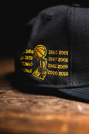 LOS ANGELES LAKERS RETRO CHAMPIONSHIP '7' SNAPBACK