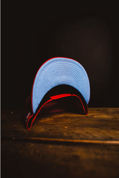 CMPD NEW ERA '7' SCARLET/BLUE SNAPBACK